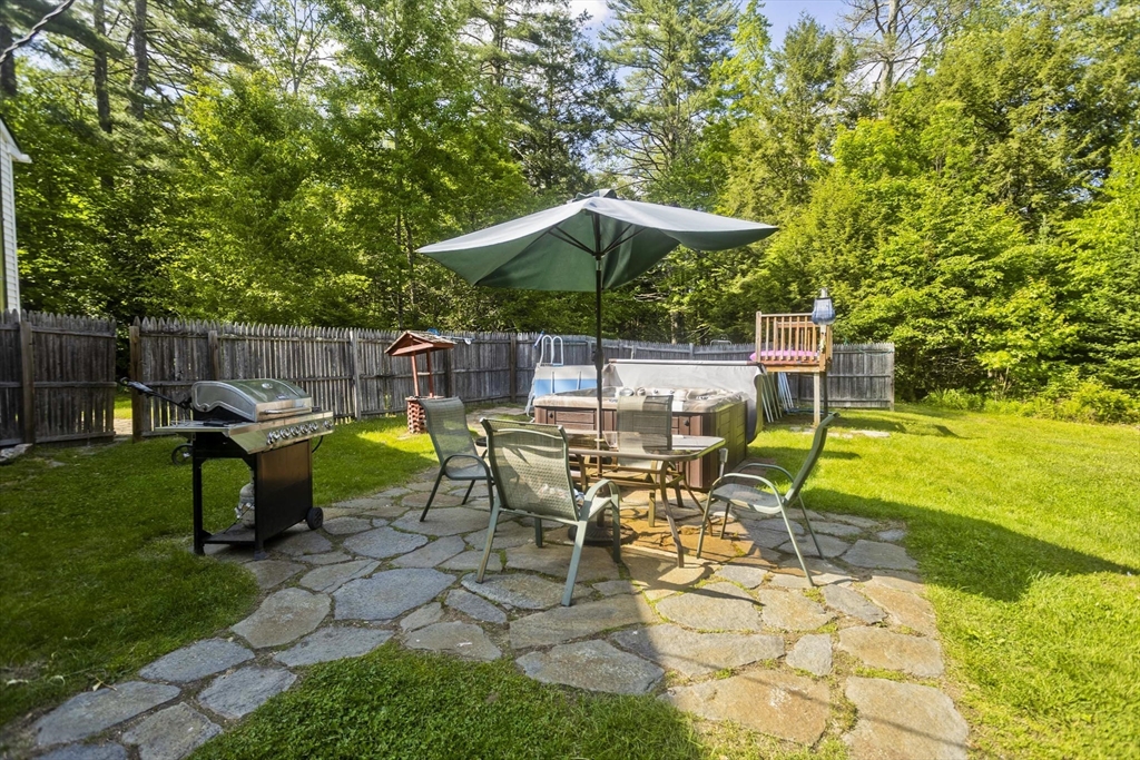 85 Damon Pond Road Chesterfield, MA 01012 - Photo 28 of 42 a view of a swimming pool with chairs in patio