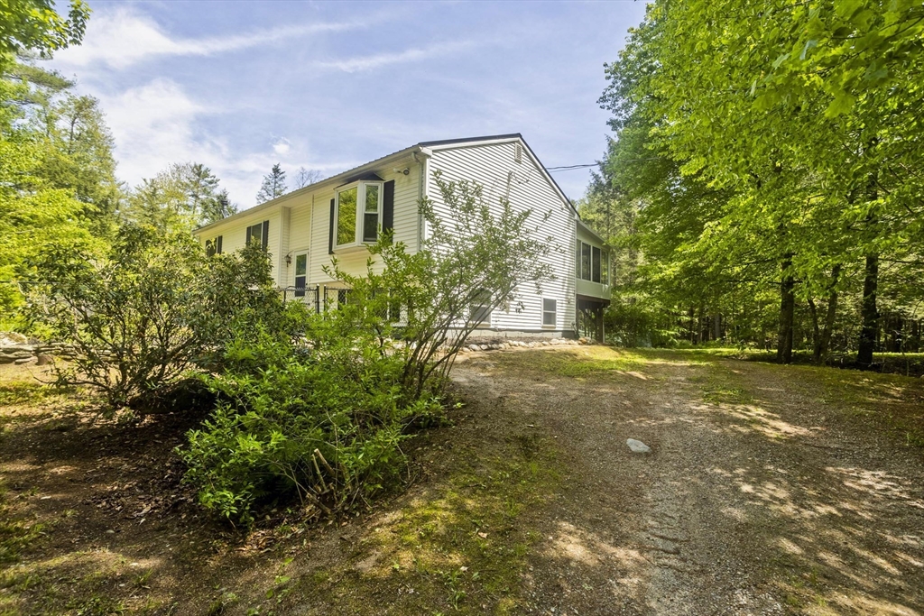 85 Damon Pond Road Chesterfield, MA 01012 - Photo 3 of 42 a view of a house with a yard