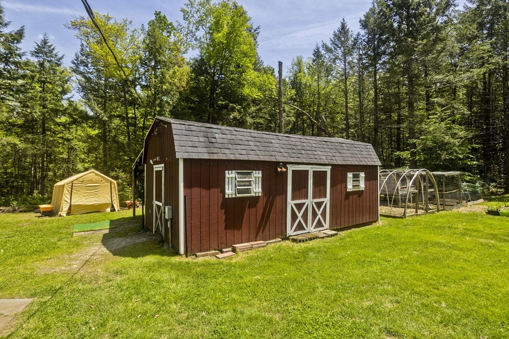 85 Damon Pond Road Chesterfield, MA 01012 - Photo 31 of 42 a view of a house with a yard
