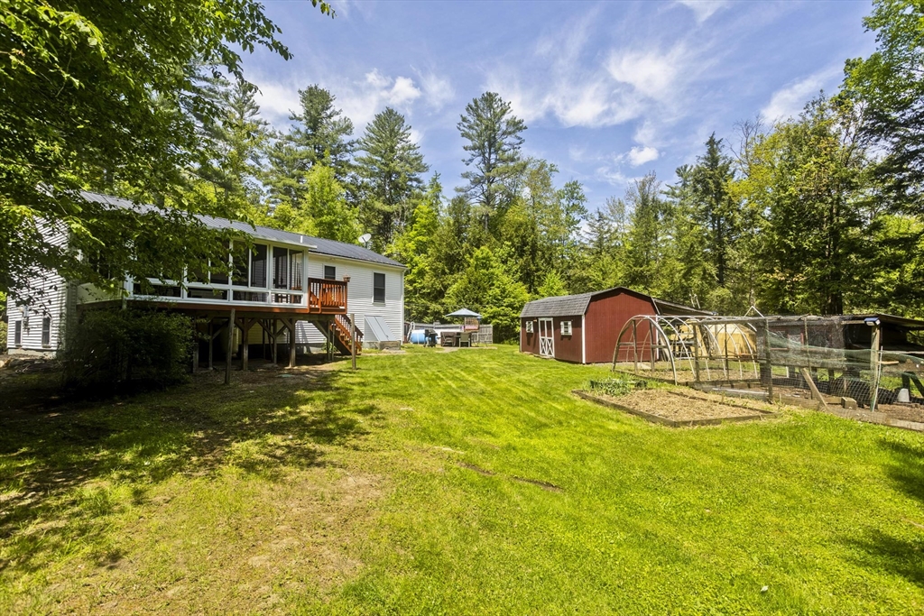 85 Damon Pond Road Chesterfield, MA 01012 - Photo 33 of 42 a house with swimming pool in front of it