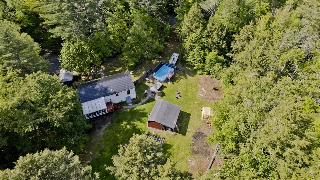 85 Damon Pond Road Chesterfield, MA 01012 - Photo 40 of 42 an aerial view of house with yard and swimming pool