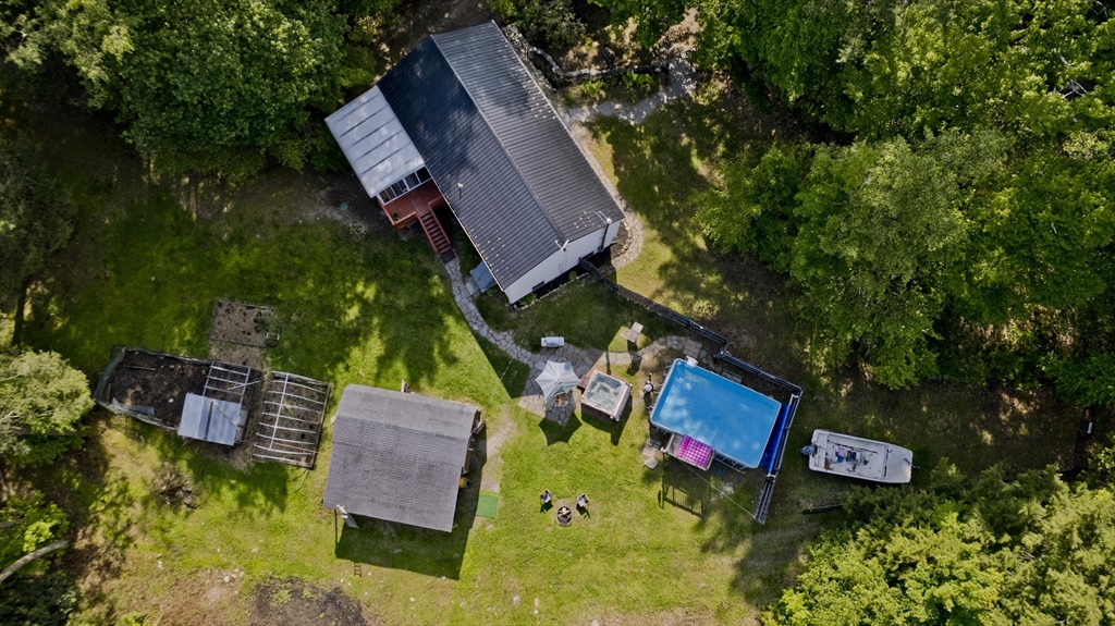 85 Damon Pond Road Chesterfield, MA 01012 - Photo 42 of 42 an aerial view of a house with swimming pool garden and patio
