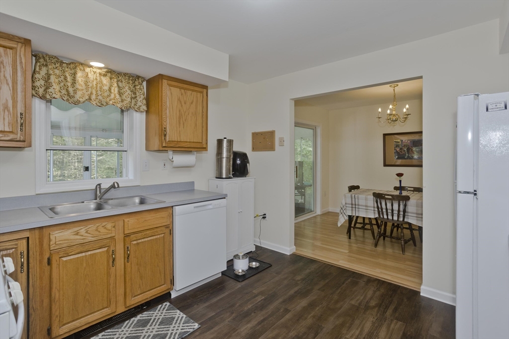85 Damon Pond Road Chesterfield, MA 01012 - Photo 5 of 42 a view of a kitchen area with furniture and wooden floor
