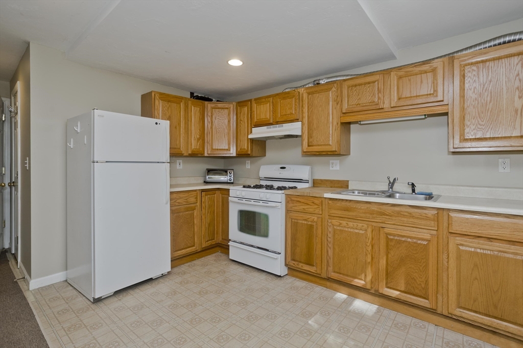85 Damon Pond Road Chesterfield, MA 01012 - Photo 6 of 42 a kitchen with stainless steel appliances granite countertop a refrigerator sink and cabinets
