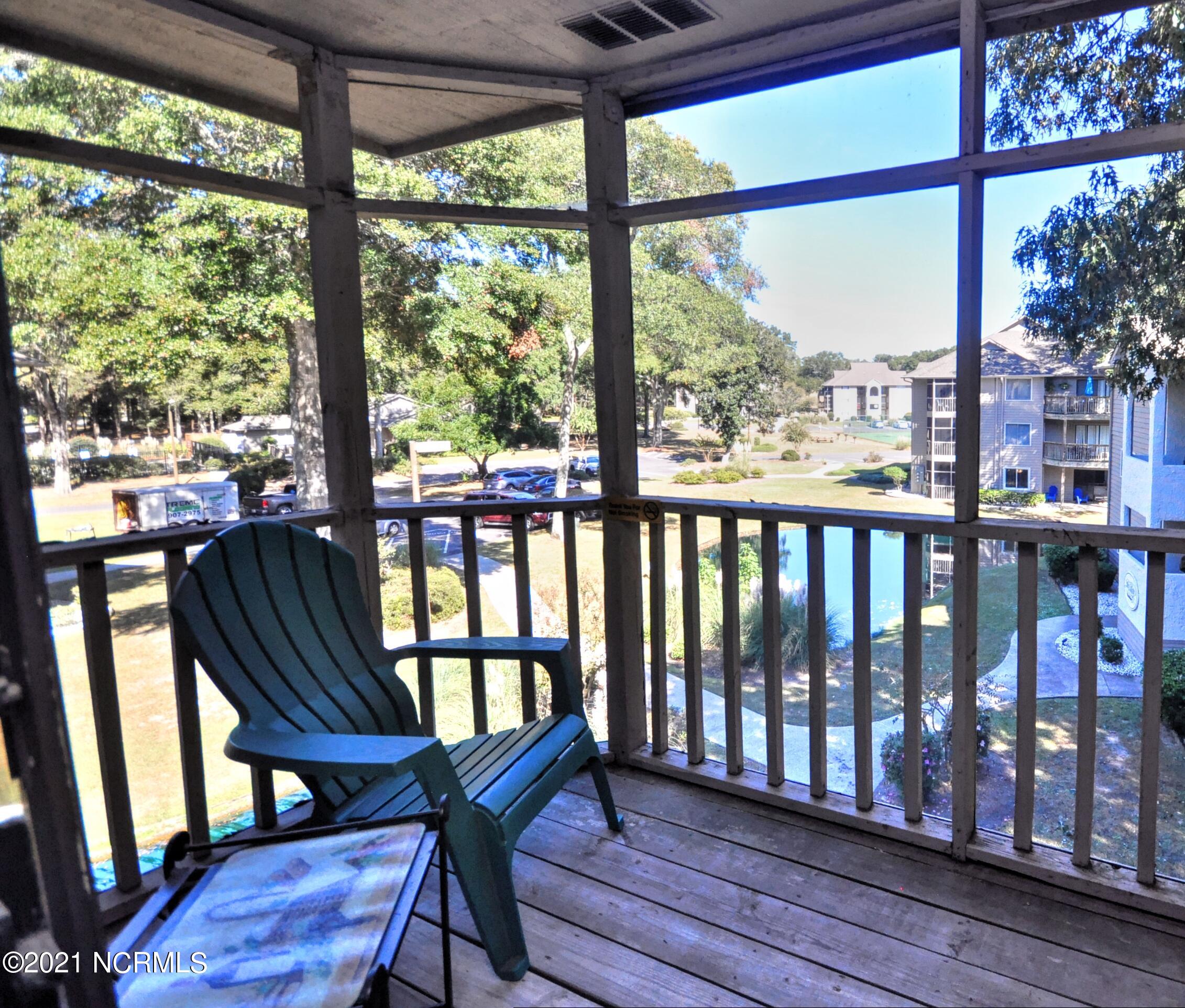 804 Colony Place, Unit 4E Sunset Beach, NC 28468 - Photo 22 of 28 BR2Screened Deck