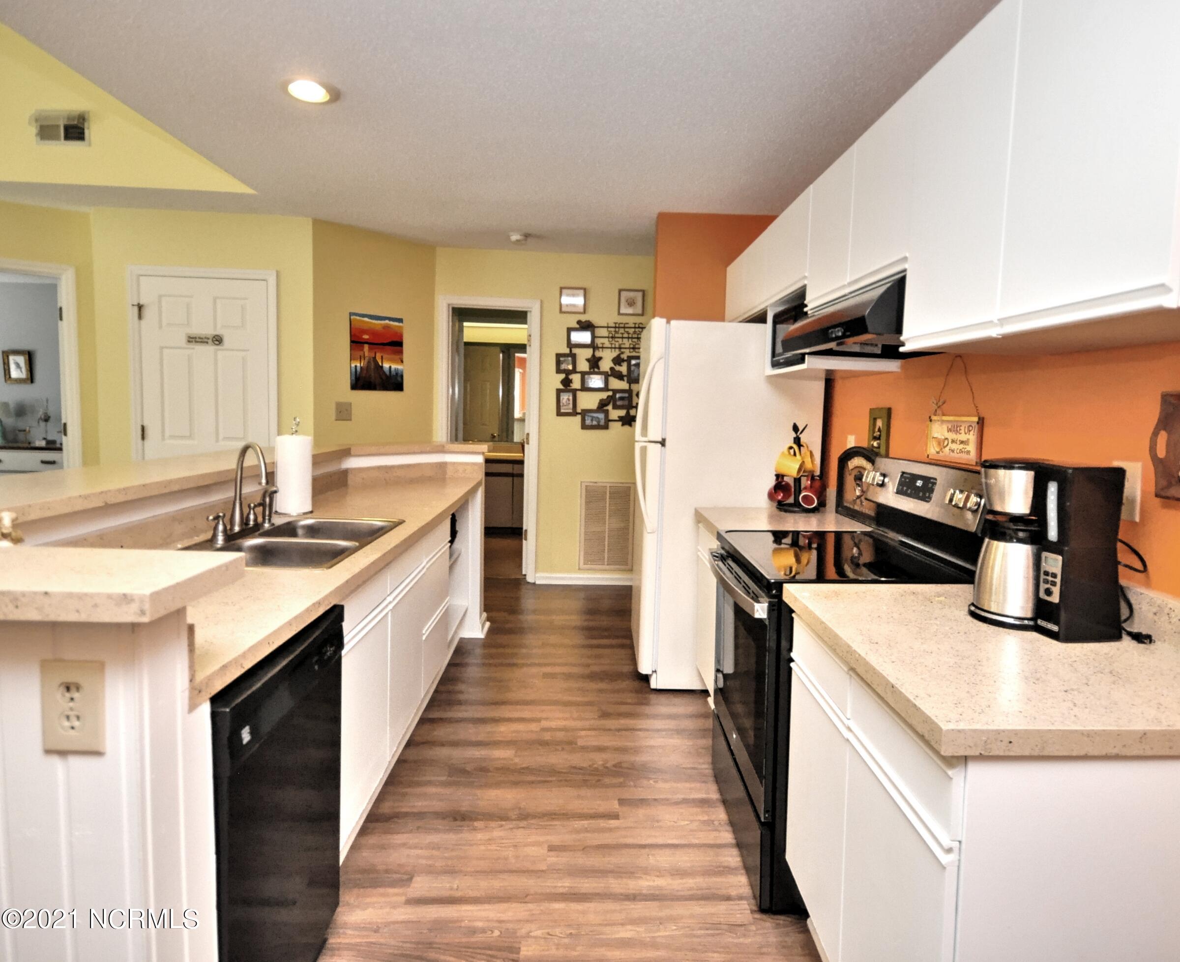 804 Colony Place, Unit 4E Sunset Beach, NC 28468 - Photo 3 of 28 Kitchen2