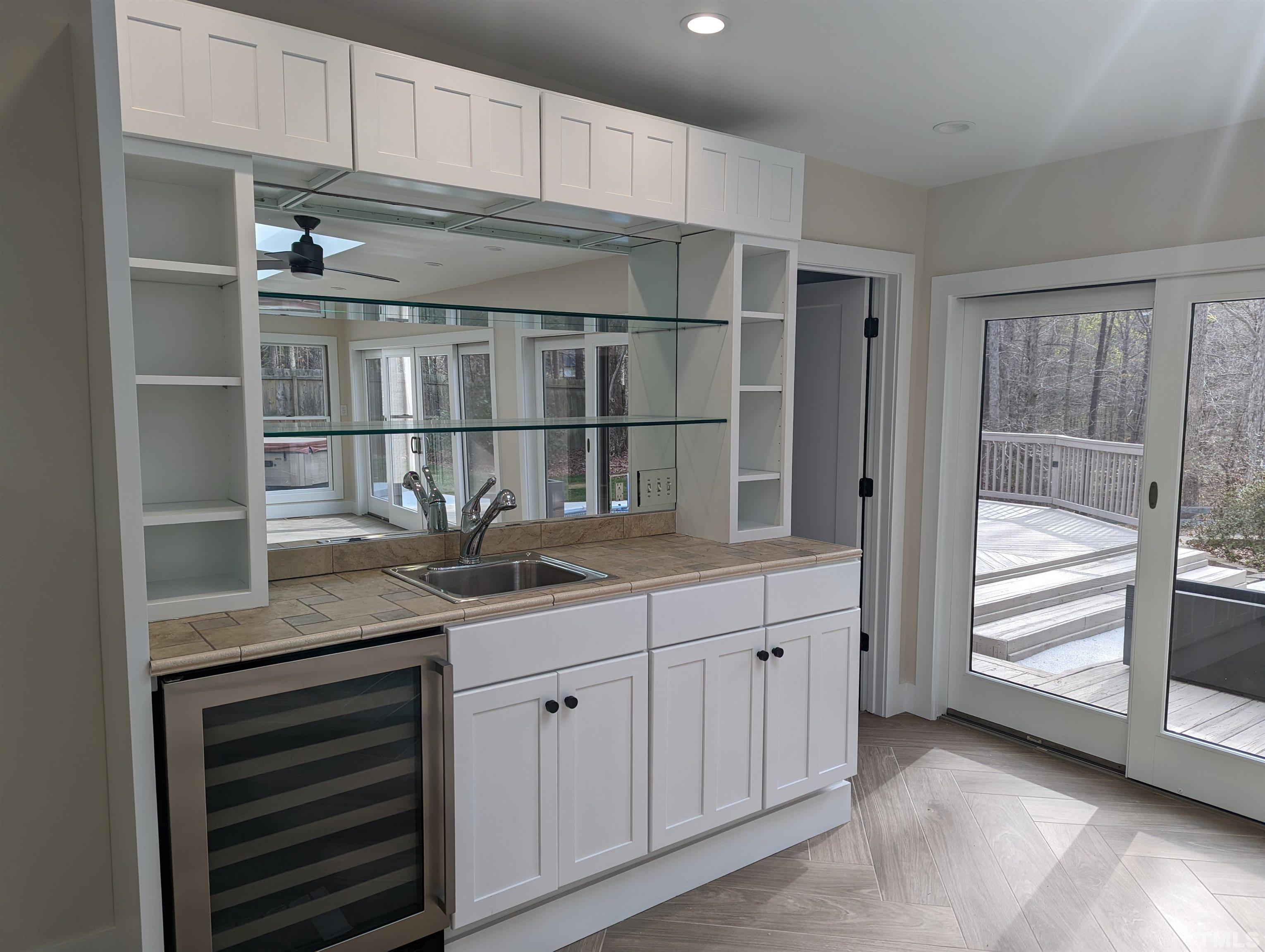 11004 Harness Circle Raleigh, NC 27614 - Photo 16 of 23 a kitchen with granite countertop a oven and cabinets