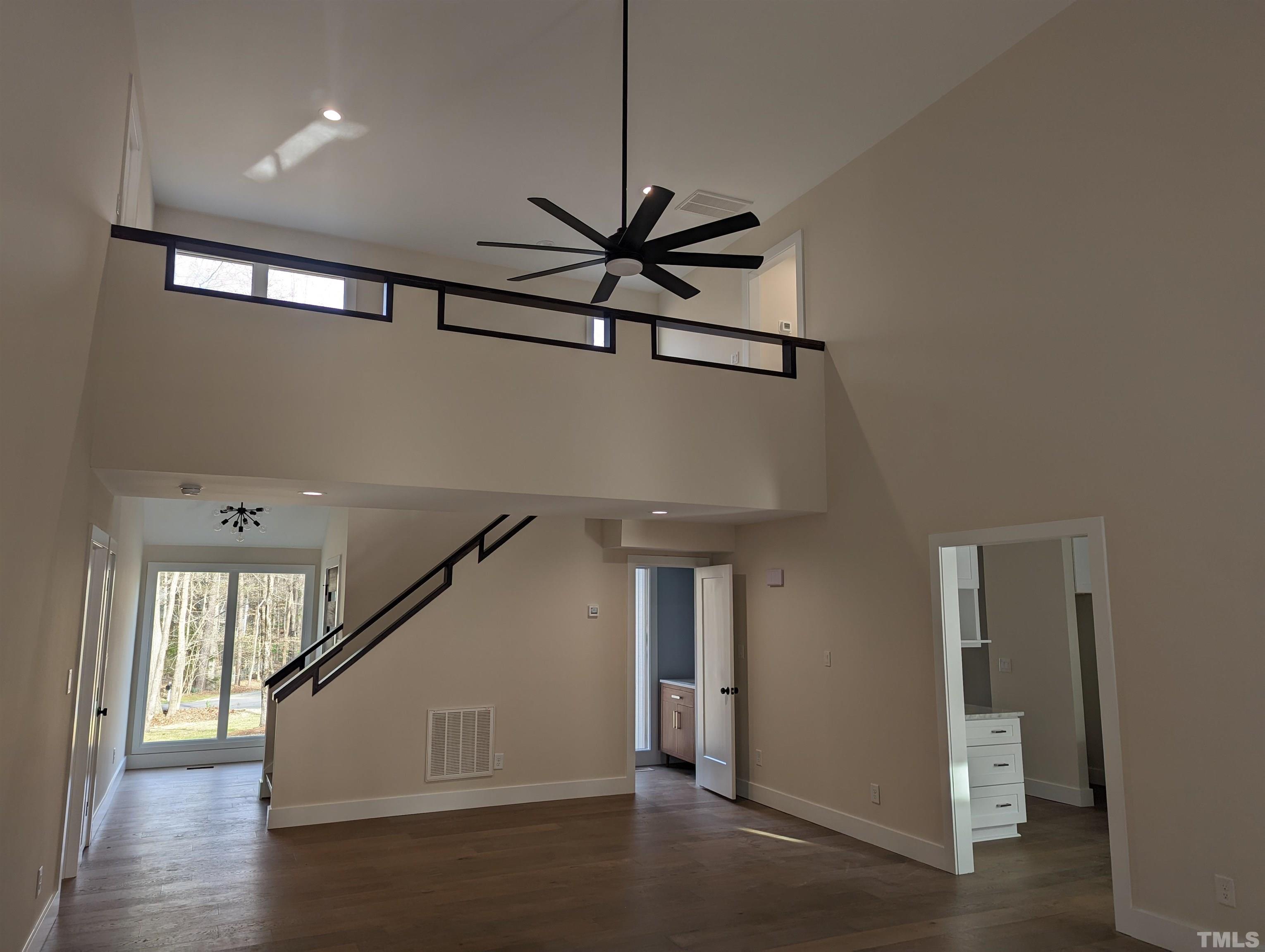 11004 Harness Circle Raleigh, NC 27614 - Photo 17 of 23 a view of a livingroom with a ceiling fan