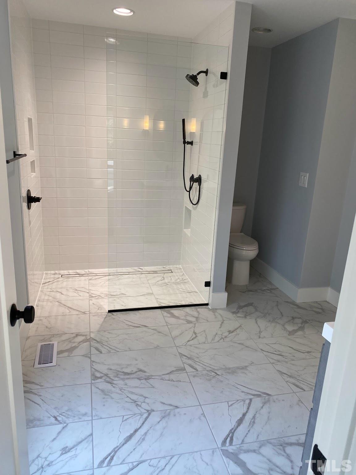 11004 Harness Circle Raleigh, NC 27614 - Photo 8 of 23 a view of bathroom with shower