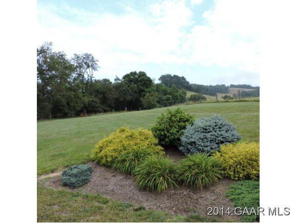 465 McKinley Road Middlebrook, VA 24459 - Photo 3 of 19 a view of a garden with a lake