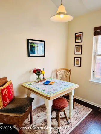a view of a dining room with furniture