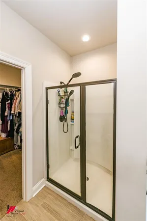 a view of a hallway with closet