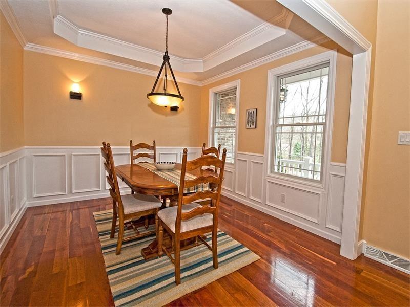 1763 Old State Road Gibsonia, PA 15044 - Photo 3 of 25 Elegant Dining Room features a tray ceiling, crown molding & wainscoting.