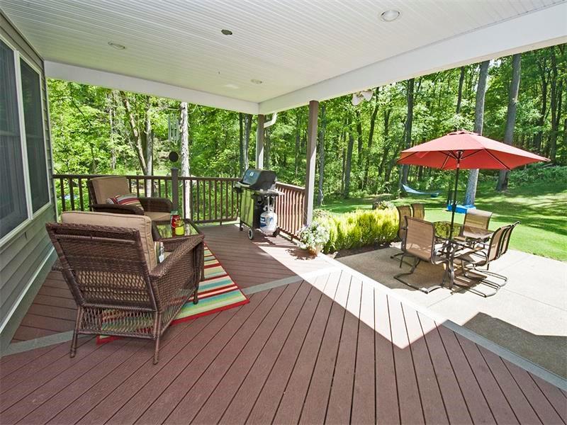 1763 Old State Road Gibsonia, PA 15044 - Photo 24 of 25 PRIVATE - Large covered Deck which opens to a large exposed aggregate Patio "relax and enjoy nature".