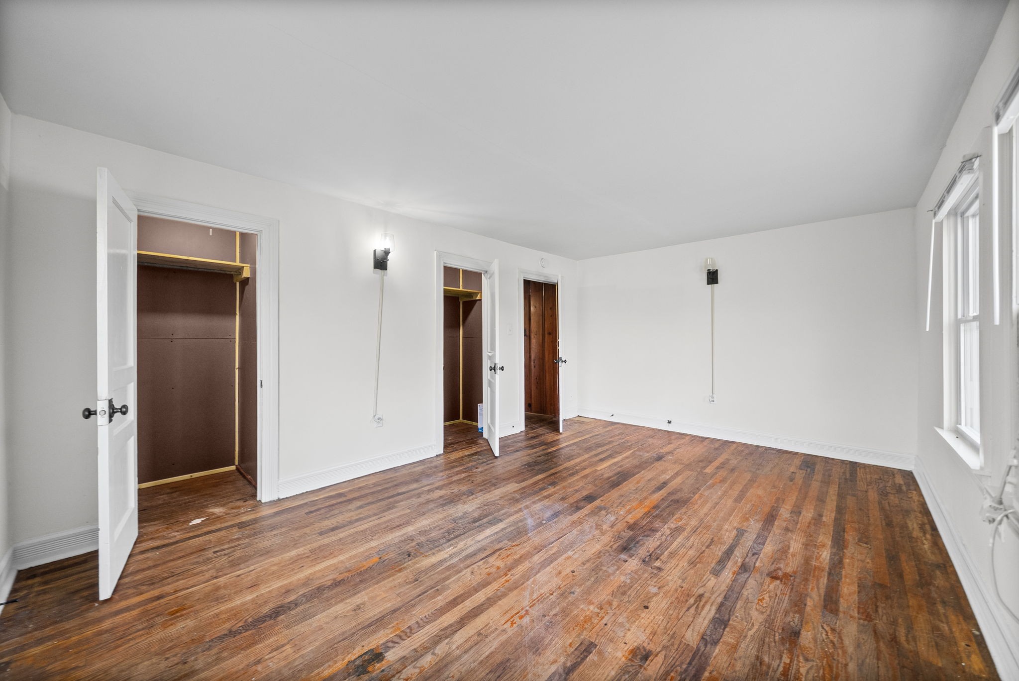 420 Lafayette Road, Unit A Clarksville, TN 37042 - Photo 23 of 25 a view of an empty room with wooden floor and a window