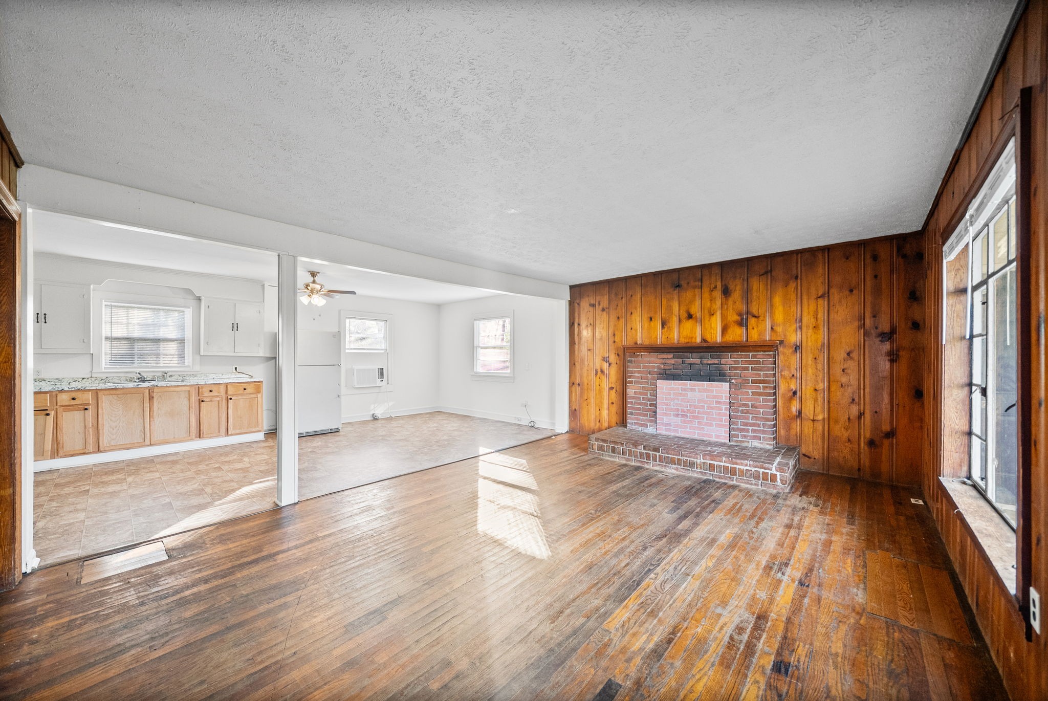420 Lafayette Road, Unit A Clarksville, TN 37042 - Photo 3 of 25 a view of empty room with wooden floor and fireplace