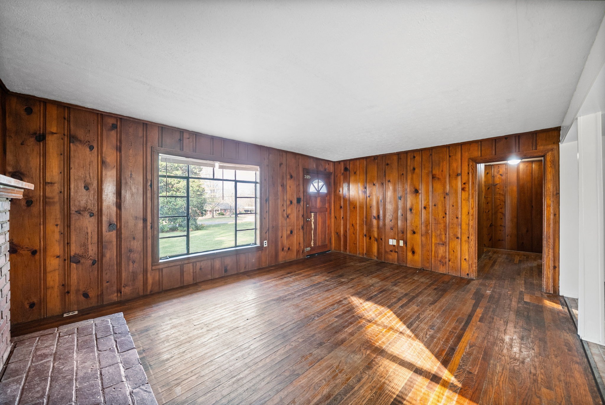 420 Lafayette Road, Unit A Clarksville, TN 37042 - Photo 4 of 25 a view of an empty room with wooden floor and a window