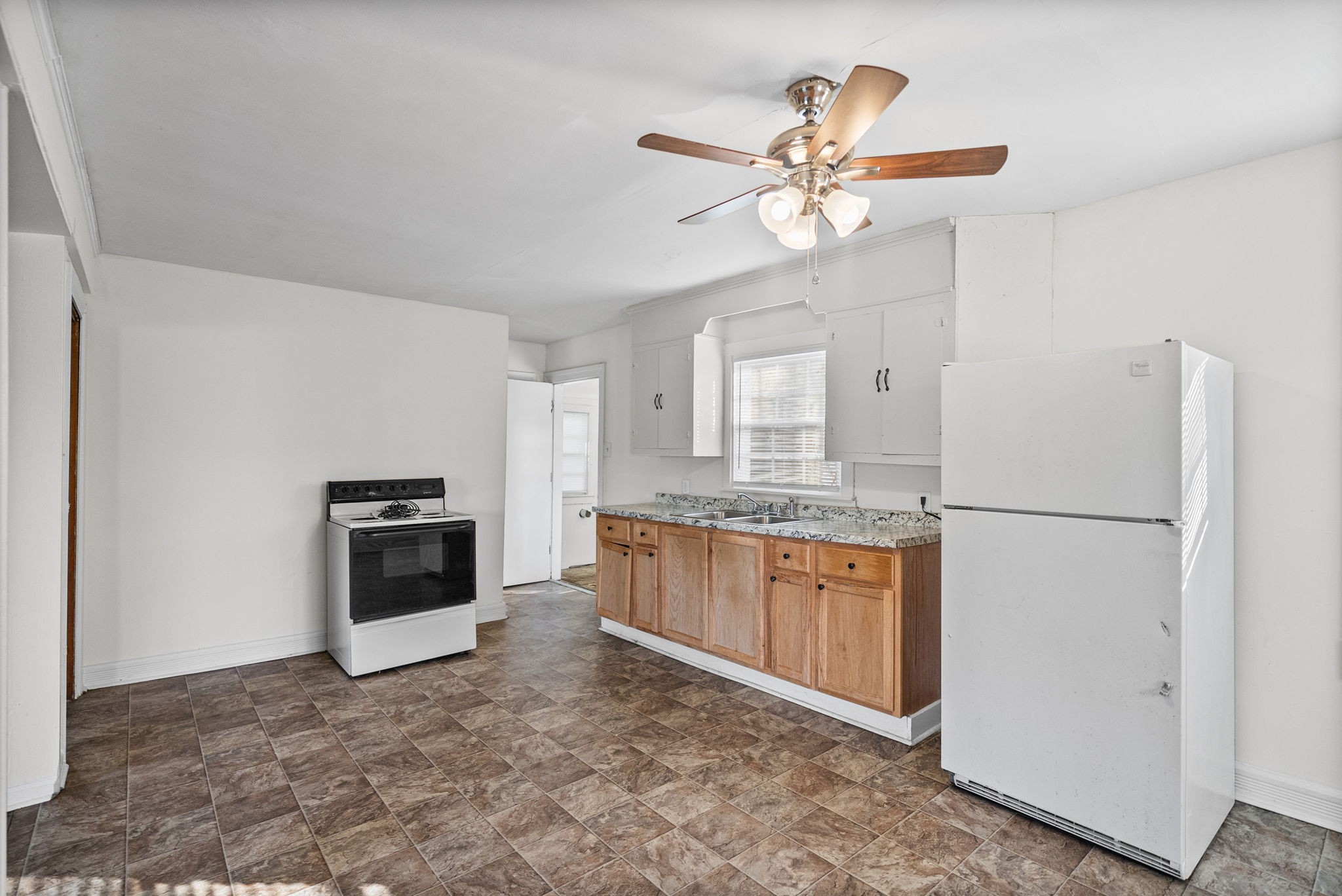 420 Lafayette Road, Unit A Clarksville, TN 37042 - Photo 9 of 25 a kitchen with stainless steel appliances granite countertop a refrigerator a sink a stove and white cabinets