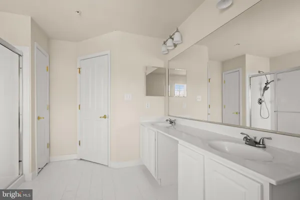 a bathroom with sink and a bathtub