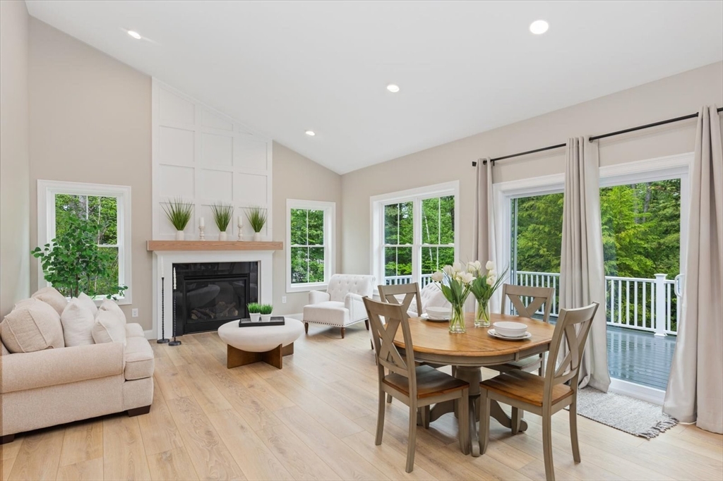 25-2 Sunset Road Westminster, MA 01473 - Photo 25 of 41 a living room with furniture and a fireplace