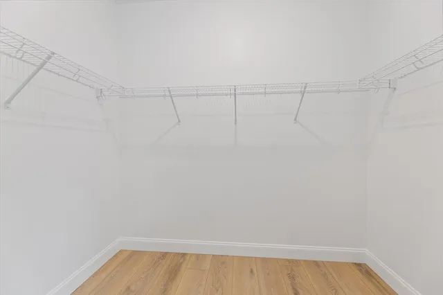 a view of a room with racks on the wall