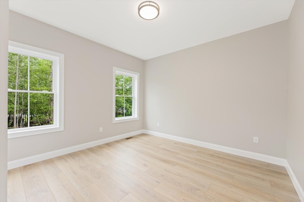 25-2 Sunset Road Westminster, MA 01473 - Photo 35 of 41 an empty room with a window