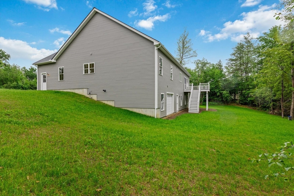 25-2 Sunset Road Westminster, MA 01473 - Photo 5 of 41 a view of a house with backyard