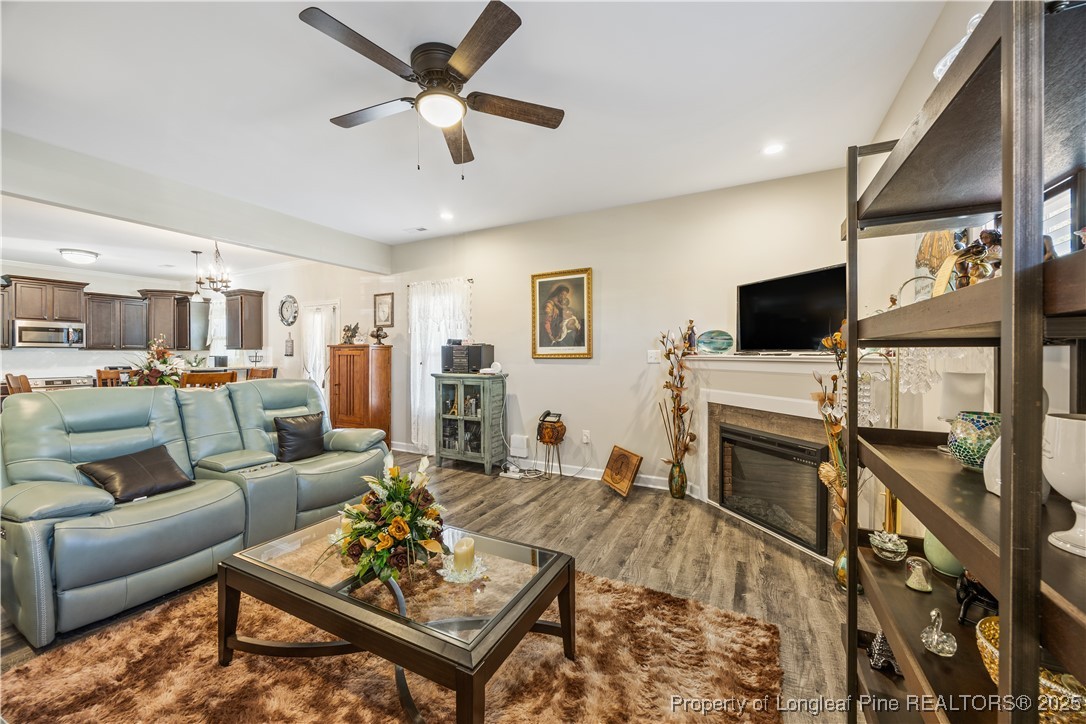 911 Townsend Road Raeford, NC 28376 - Photo 19 of 46 a living room with furniture and a flat screen tv