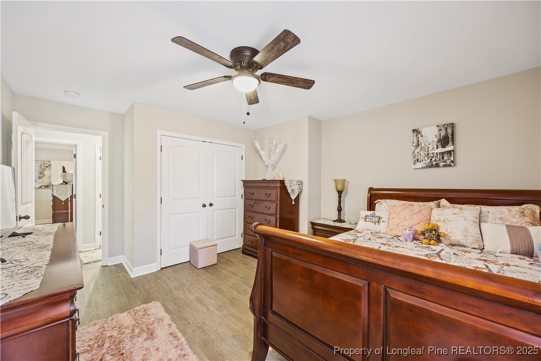 911 Townsend Road Raeford, NC 28376 - Photo 23 of 46 a living room with furniture and a chandelier