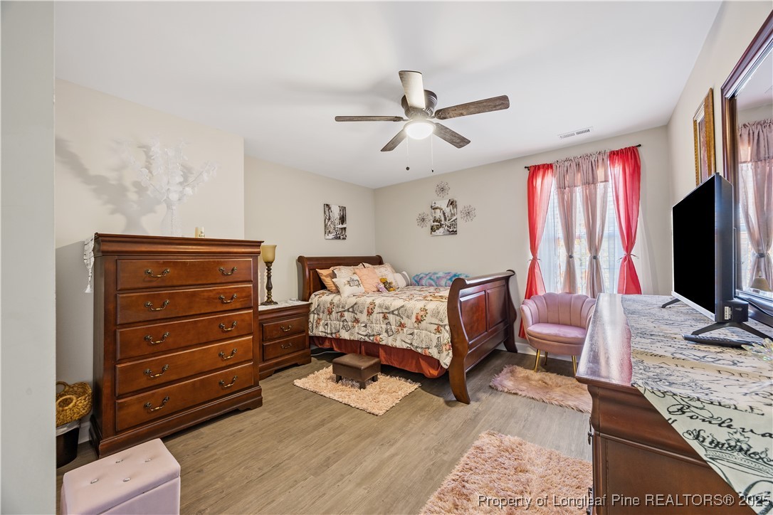 911 Townsend Road Raeford, NC 28376 - Photo 24 of 46 a bedroom with a bed and furniture