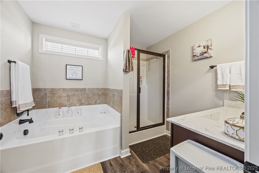 911 Townsend Road Raeford, NC 28376 - Photo 35 of 46 a bathroom with a tub and a sink