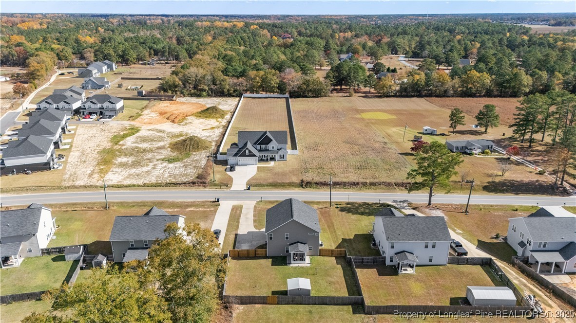911 Townsend Road Raeford, NC 28376 - Photo 45 of 46 an aerial view of a house with a swimming pool