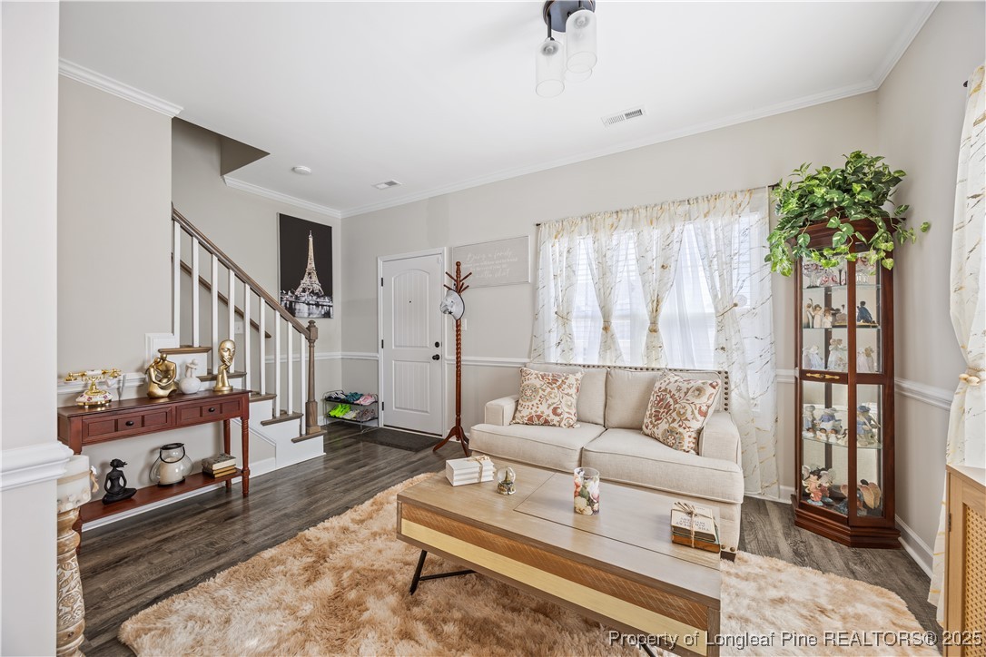 911 Townsend Road Raeford, NC 28376 - Photo 6 of 46 a living room with furniture and a potted plant