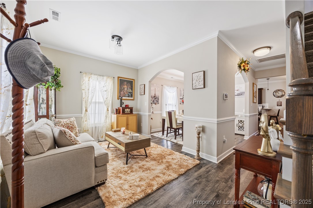 911 Townsend Road Raeford, NC 28376 - Photo 7 of 46 a living room with furniture and a flat screen tv