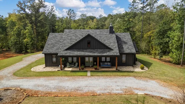a view of a swimming pool in he middle of the house