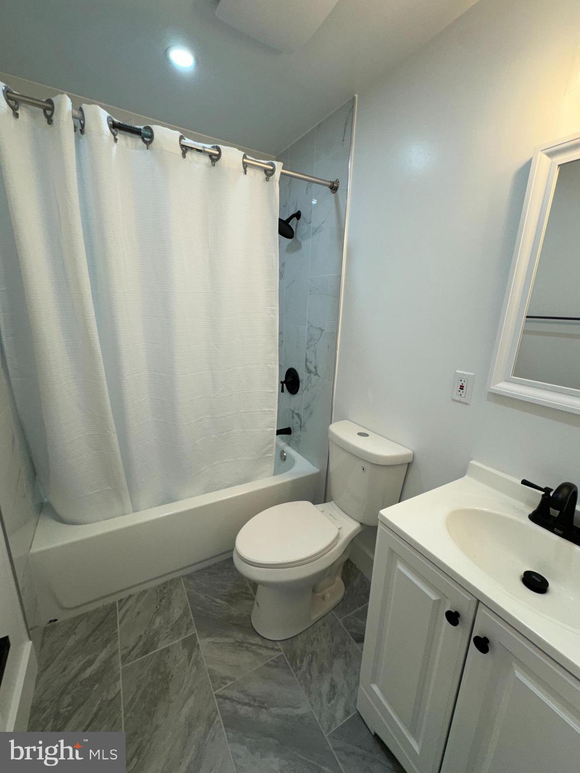 8606 Verree Road Philadelphia, PA 19115 - Photo 33 of 40 a bathroom with a sink toilet and shower