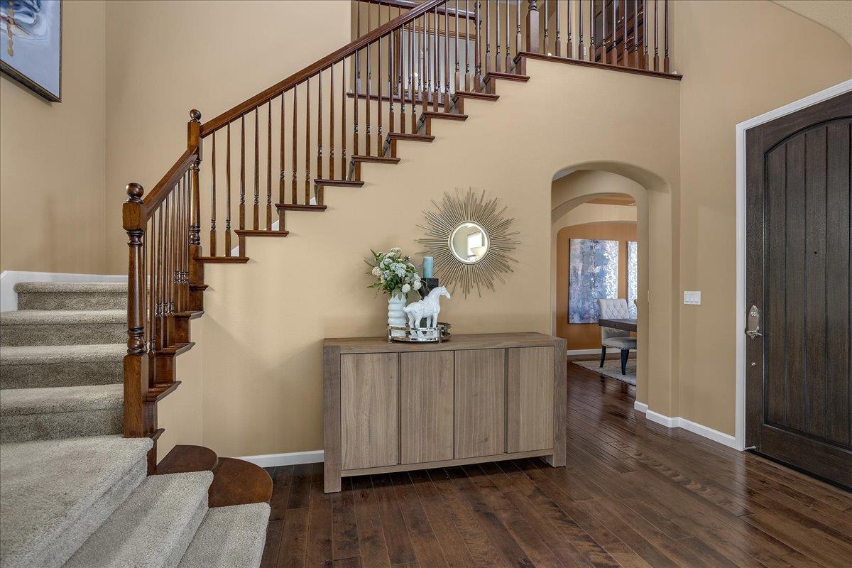 7626 Braid Court Gilroy, CA 95020 - Photo 11 of 49 a view of a hallway with wooden floor and staircase