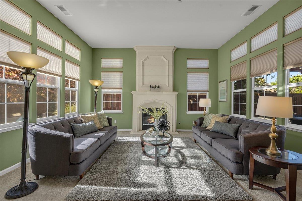 7626 Braid Court Gilroy, CA 95020 - Photo 13 of 49 a living room with furniture large window and a table
