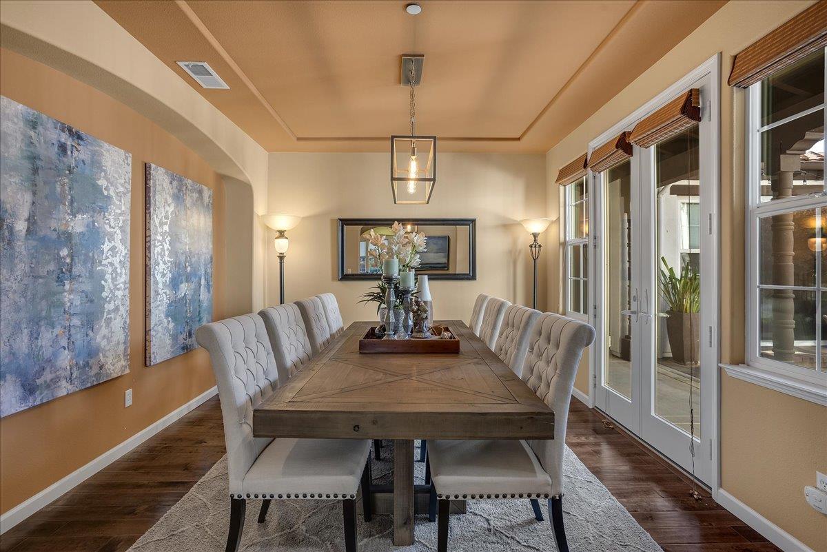 7626 Braid Court Gilroy, CA 95020 - Photo 14 of 49 a view of a dining room with furniture window and wooden floor