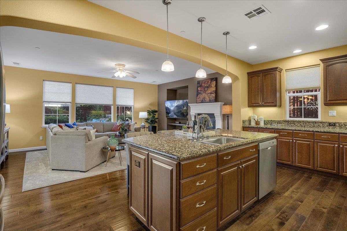 7626 Braid Court Gilroy, CA 95020 - Photo 17 of 49 a kitchen with a stove a sink and a refrigerator