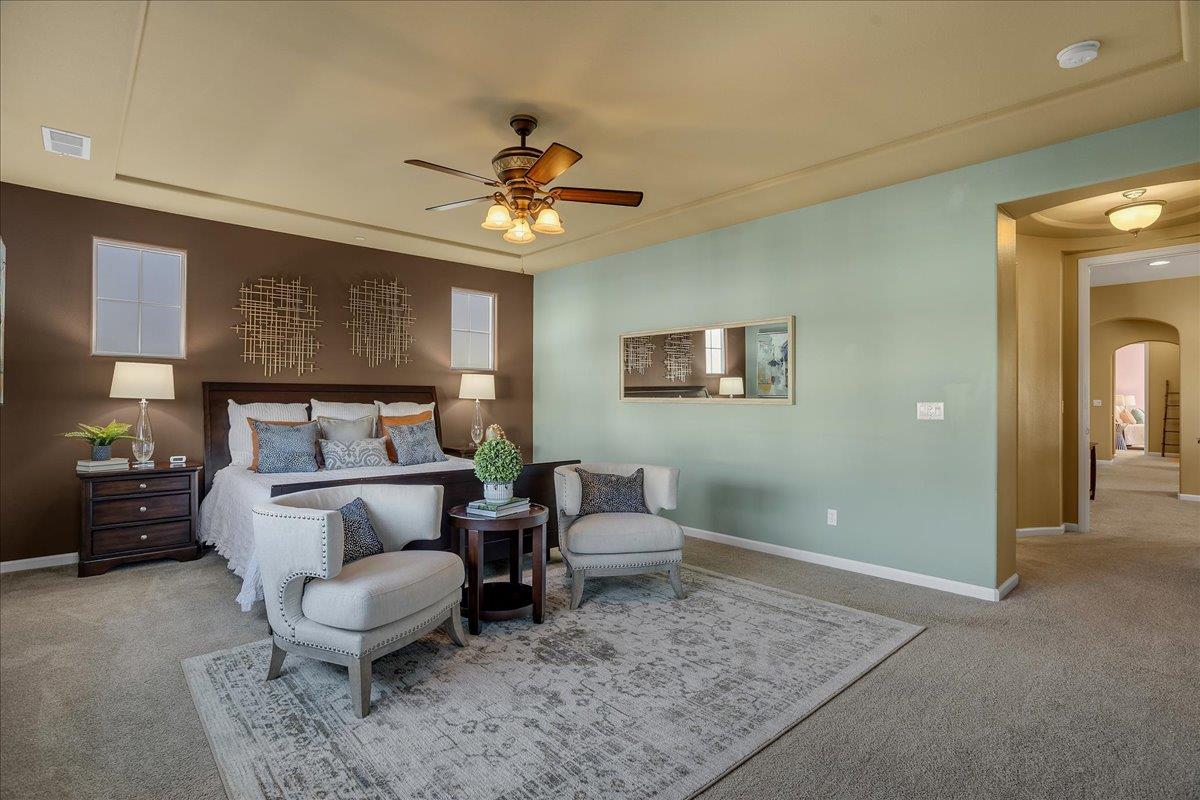 7626 Braid Court Gilroy, CA 95020 - Photo 30 of 49 a living room with furniture and a chandelier
