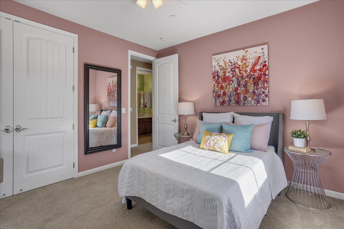 7626 Braid Court Gilroy, CA 95020 - Photo 34 of 49 a bedroom with a bed and a painting on the wall