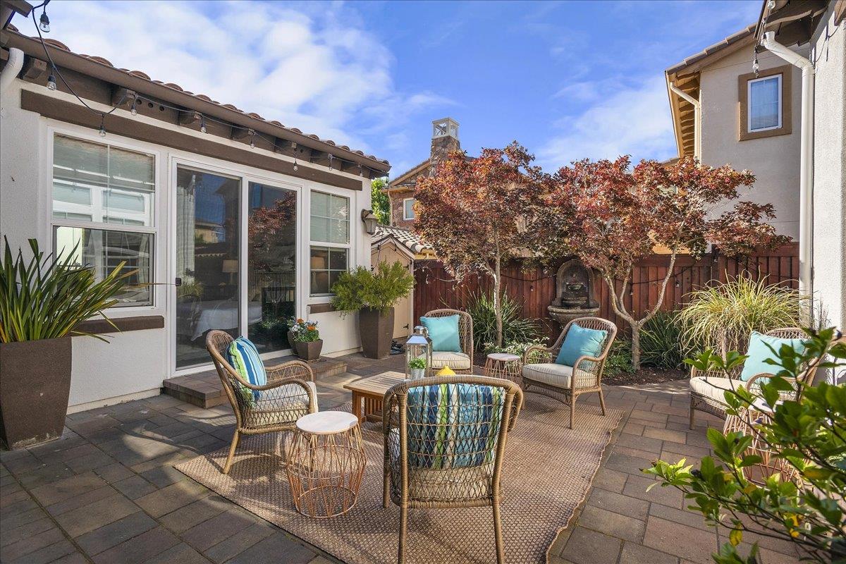 7626 Braid Court Gilroy, CA 95020 - Photo 5 of 49 a view of a patio with table and chairs and potted plants