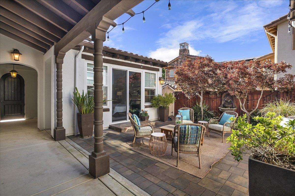 7626 Braid Court Gilroy, CA 95020 - Photo 7 of 49 a building outdoor space with patio furniture and potted plants