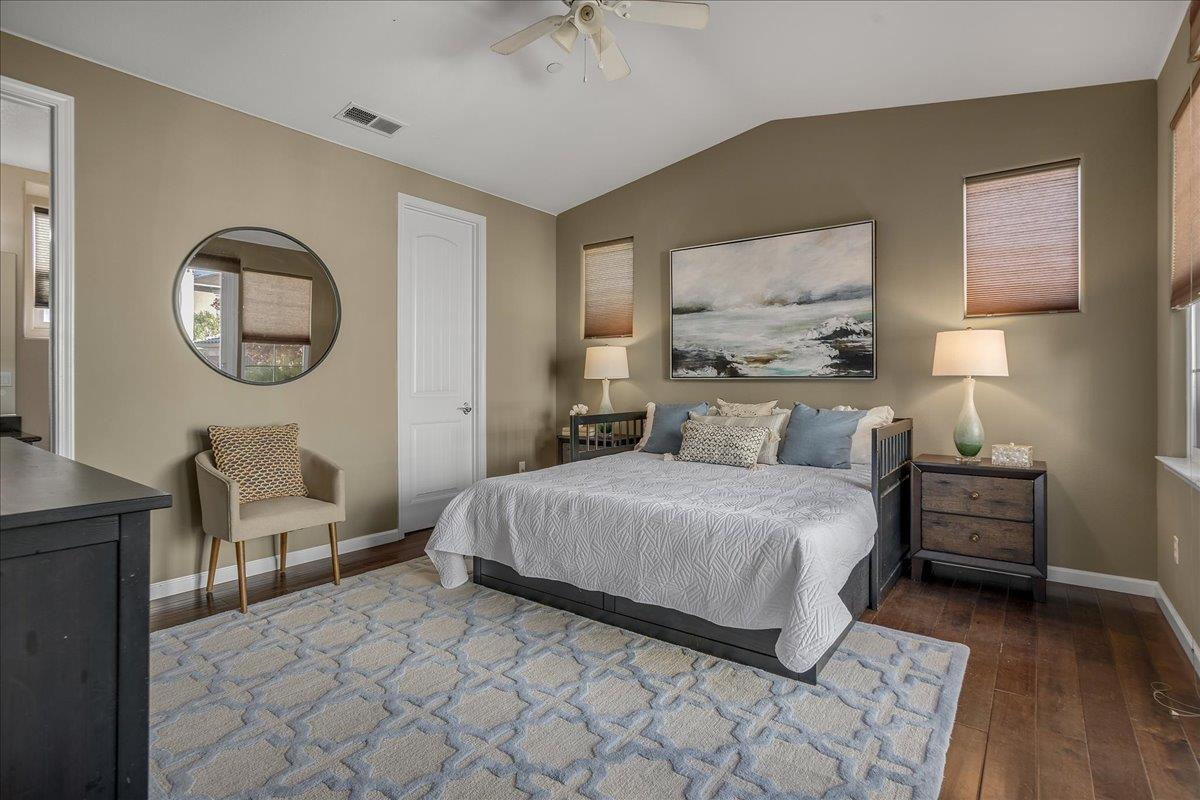 7626 Braid Court Gilroy, CA 95020 - Photo 8 of 49 a bedroom with a bed and a lamp on dresser