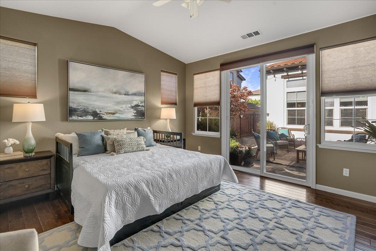 7626 Braid Court Gilroy, CA 95020 - Photo 9 of 49 a bedroom with a large bed and a large window