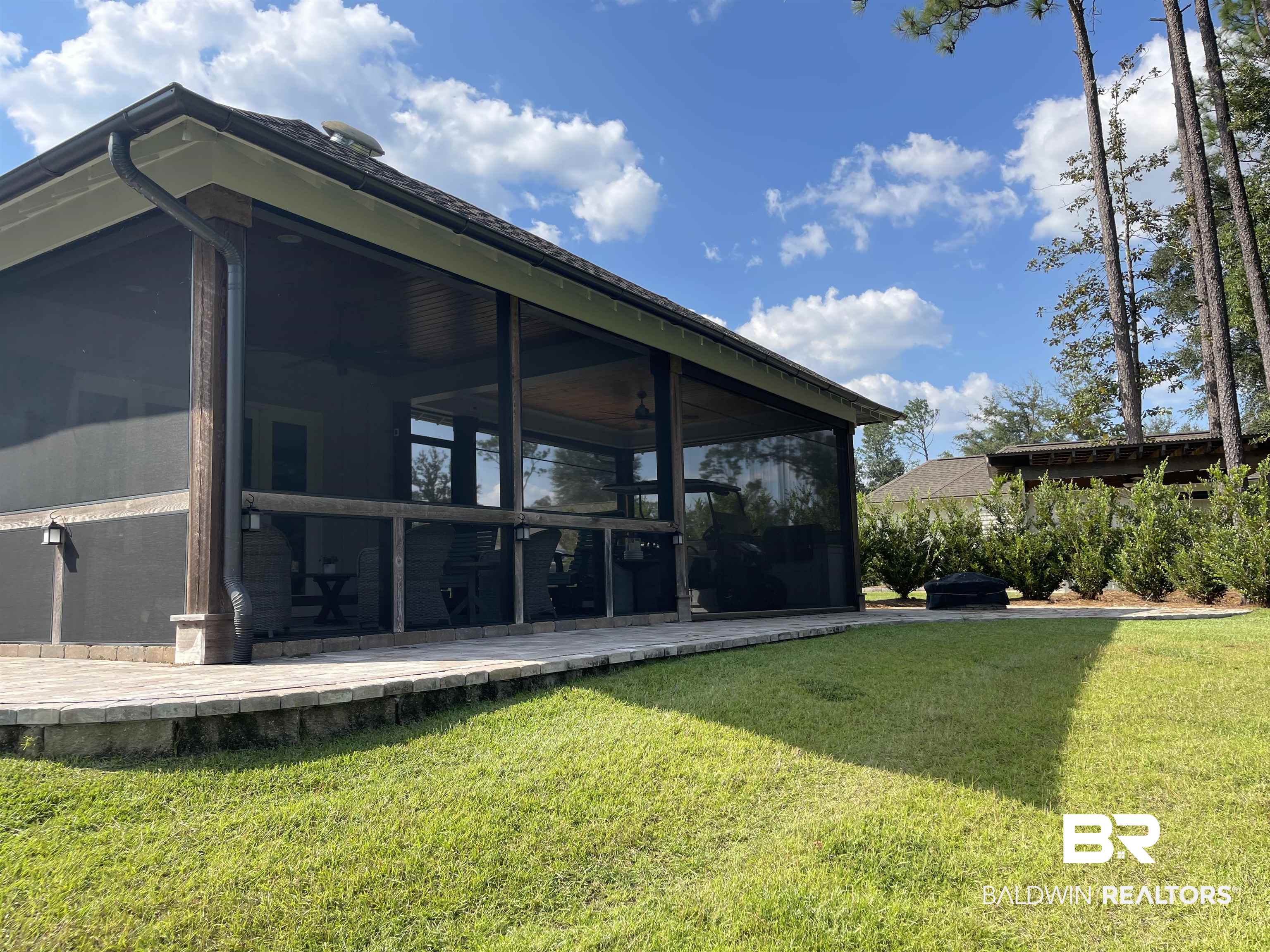 6 Fairhope Motorcoach Loop Fairhope, AL 36532 - Photo 21 of 33 Rear view of property with a yard, a sunroom, and a patio