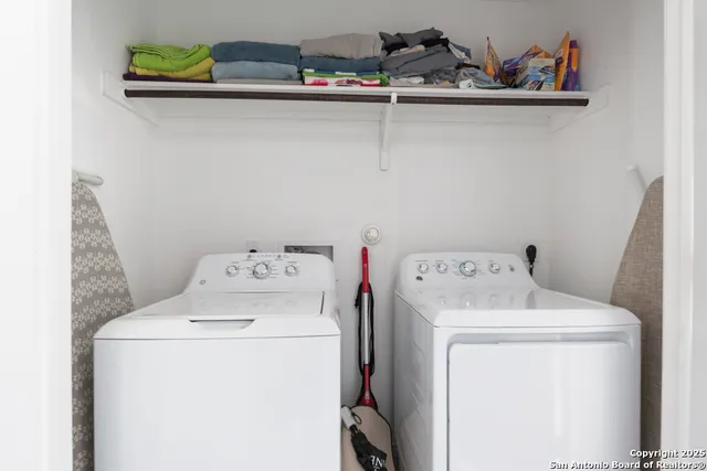 a utility room with dryer and washer
