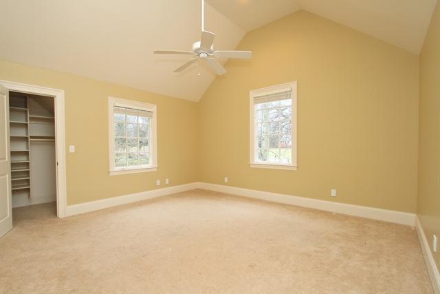 4014 Estes Road Nashville, TN 37215 - Photo 13 of 20 This bedroom features a 12ft vaulted ceiling, walk-in closet and a shared bathroom suite.
