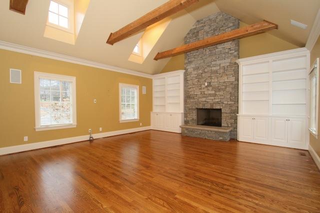 4014 Estes Road Nashville, TN 37215 - Photo 6 of 20 Gather with friends and family in this spacious room with beamed vaulted ceiling, floor to ceiling stone fireplace and lots of built-ins.
